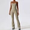 Woman in olive green workout outfit.