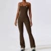 Woman in brown activewear outfit.