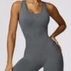 Model wearing a form-fitting athletic outfit.