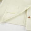 Light-colored fabric with textured pattern.