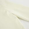 Light textured fabric in soft cream color.