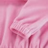 Pink fleece garment close-up, textured fabric.